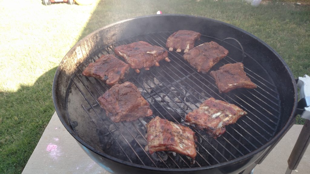 Ribs Being Blessed By the Grill